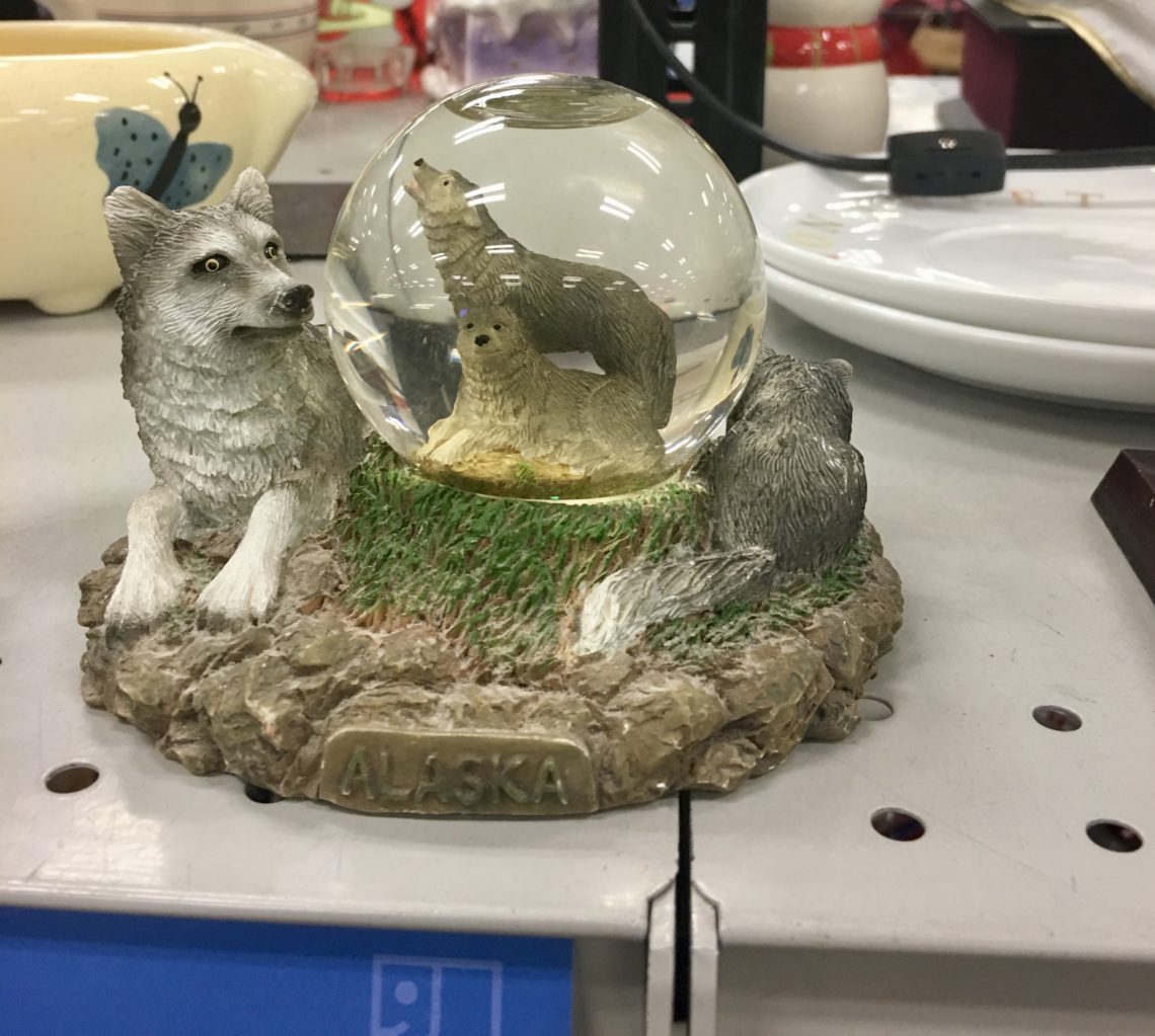 A wolf-themed snow globe